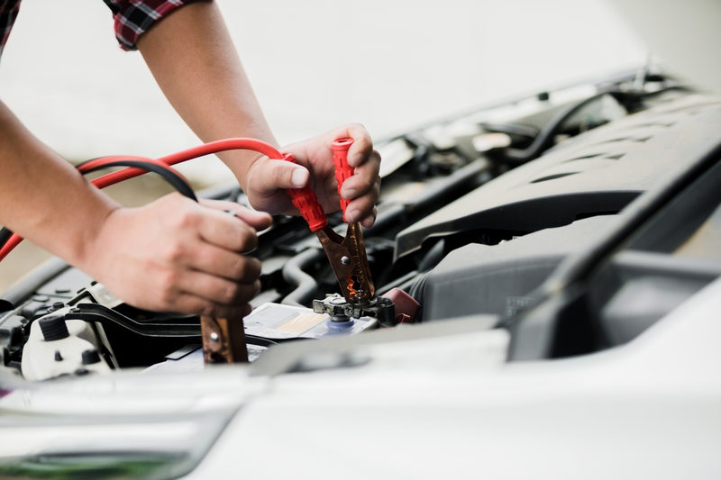 Man Using Jump Leads